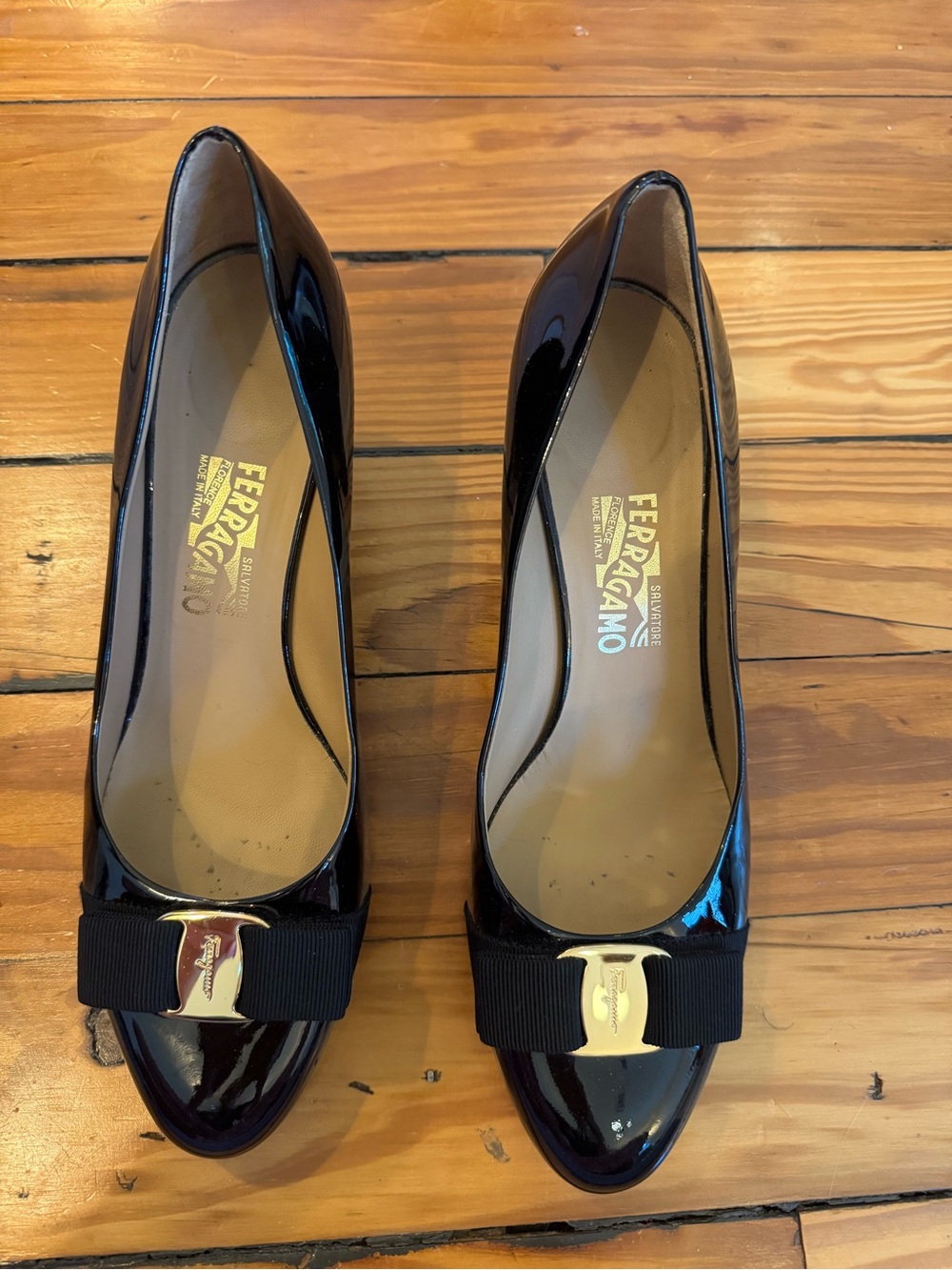Salvatore Ferragamo Black Patent Leather Bow Pumps with Gold Accent